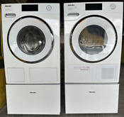Miele White Side By Side On Pedestals Washer Dryer Set