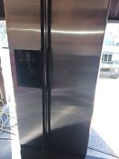 23 5 Cubic Foot Side By Side General Electric Refrigerator With A Ice Maker 